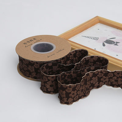 Lente de renda floral em relevo de poliéster de 25 mm