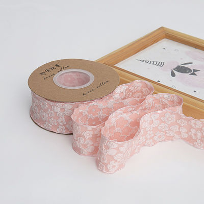 Lente de renda floral em relevo de poliéster de 25 mm