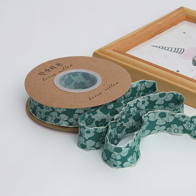 Lente de renda floral em relevo de poliéster de 25 mm
