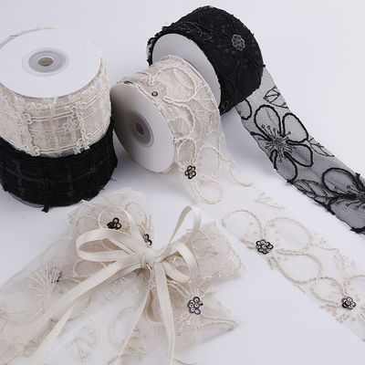 Lente de malha de poliéster brilhante de 50 mm com fita de jacquard floral