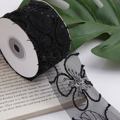 Lente de malha de poliéster brilhante de 50 mm com fita de jacquard floral